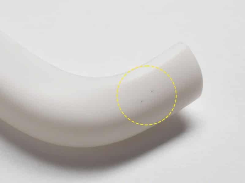 Black Spots on Plastic Defects